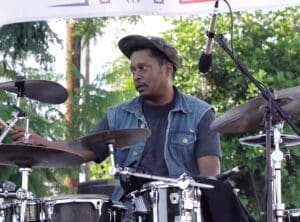 Chris Dave on drums